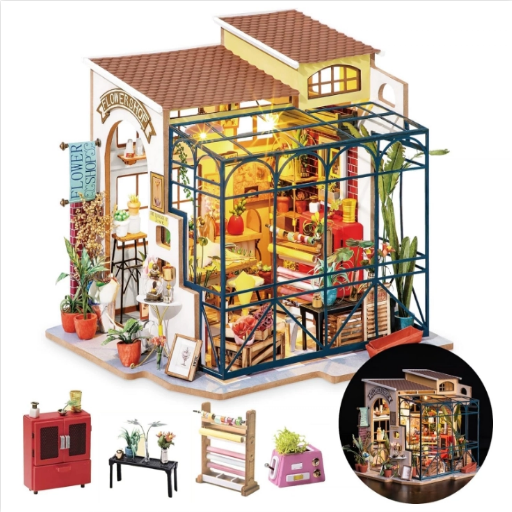 a miniature house with a glass roof and a small planter
